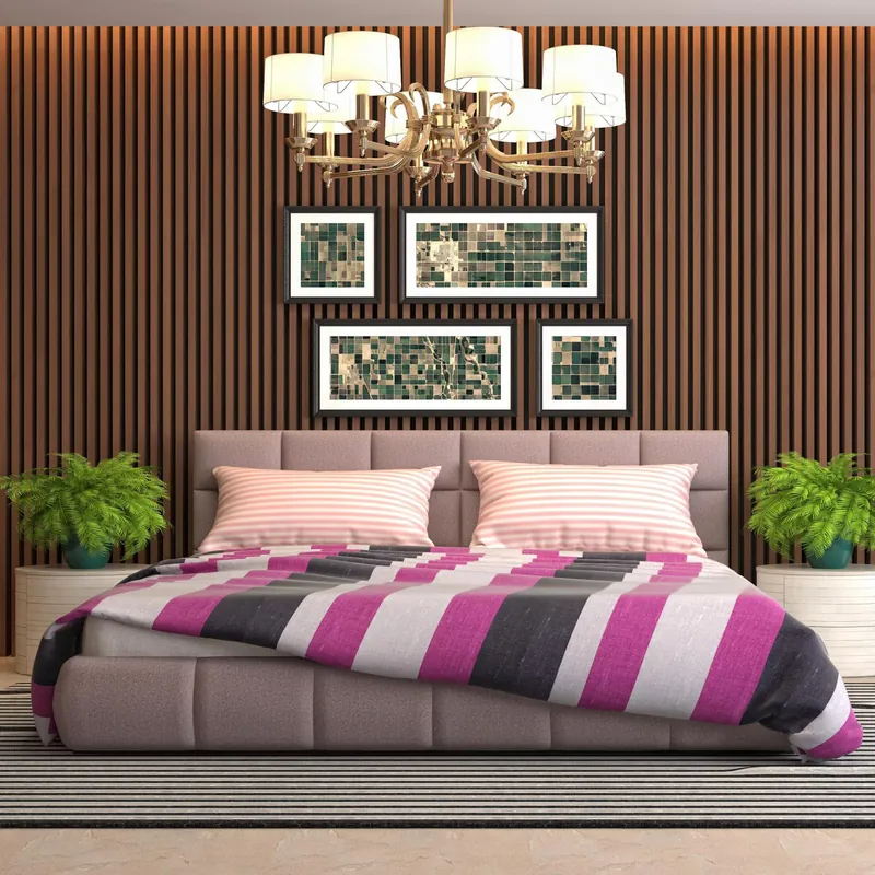 Dark wood louver wall behind a bed with framed art